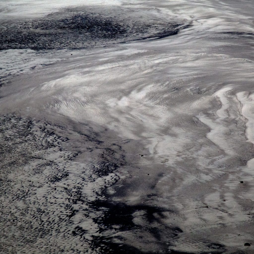 Grey and white aerial image of clouds